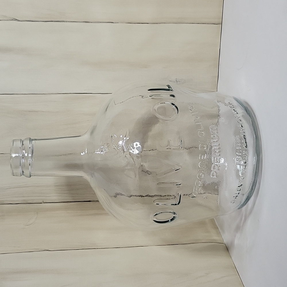 Glass virgin olive oil bottle